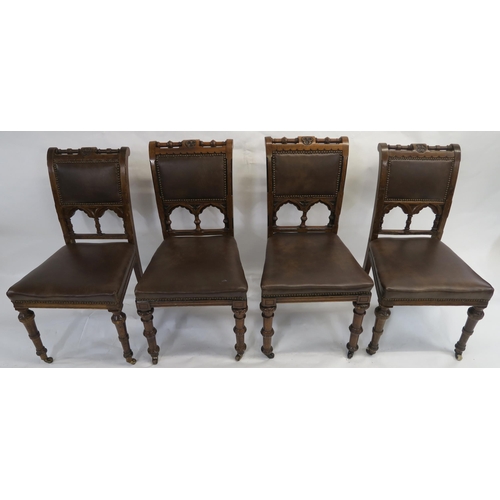 85 - A SET OF EIGHT PUGINESQUE OAK DINING CHAIRS