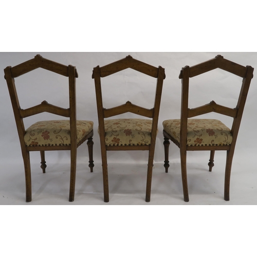 86 - A SET OF EIGHT ARTS AND CRAFTS OAK DINING CHAIRS