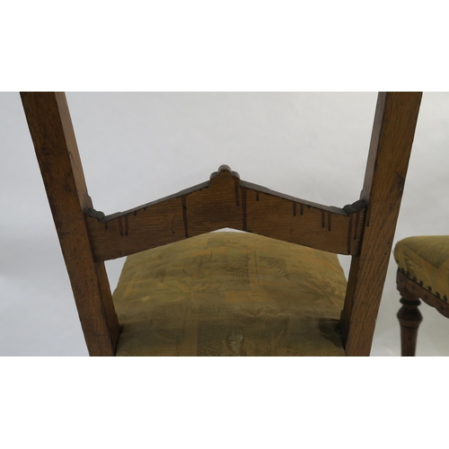 86 - A SET OF EIGHT ARTS AND CRAFTS OAK DINING CHAIRS