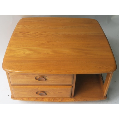 114 - AN ERCOL PANDORA COFFEE TABLE