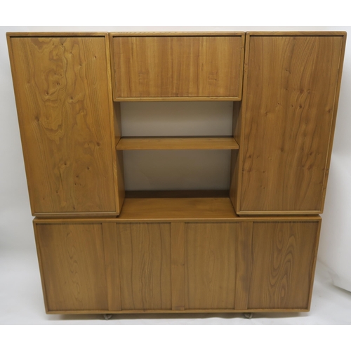 115 - AN ERCOL WINDSOR WALL DISPLAY UNIT