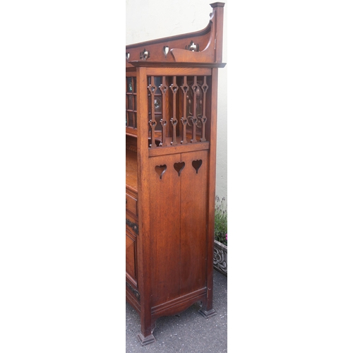 36 - AN ARTS AND CRAFTS OAK SIDEBOARD