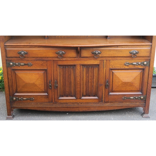 36 - AN ARTS AND CRAFTS OAK SIDEBOARD