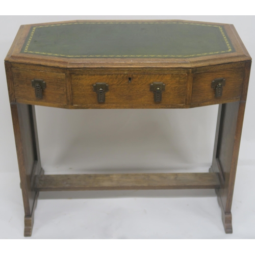 61 - A COTSWOLD SCHOOL OAK DESK WITH GREEN LEATHER SKIVER