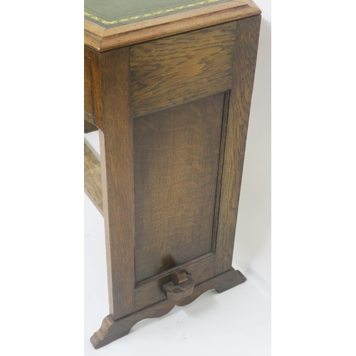 61 - A COTSWOLD SCHOOL OAK DESK WITH GREEN LEATHER SKIVER