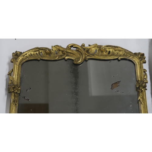 63 - A 19th CENTURY GILT FRAMED WALL MIRROR 120CM X 52CM