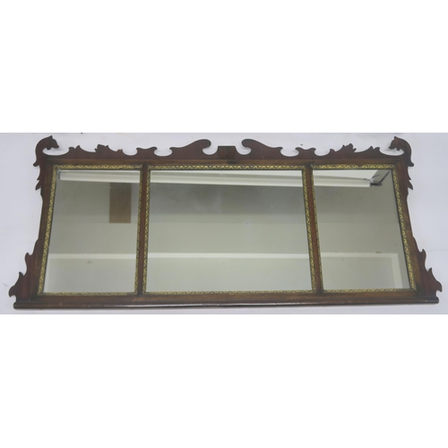 64 - A GEORGIAN STYLE WALNUT TRIPTYCH MIRROR WITH CARVED FRAME