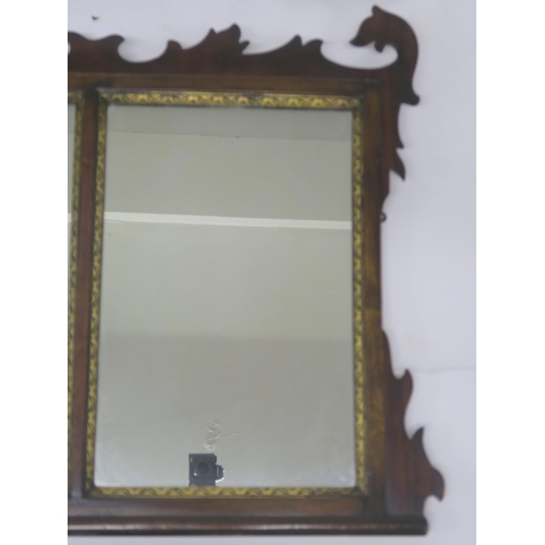 64 - A GEORGIAN STYLE WALNUT TRIPTYCH MIRROR WITH CARVED FRAME