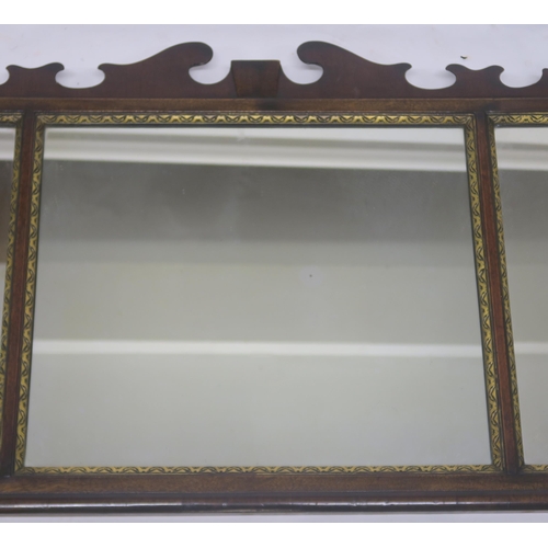 64 - A GEORGIAN STYLE WALNUT TRIPTYCH MIRROR WITH CARVED FRAME