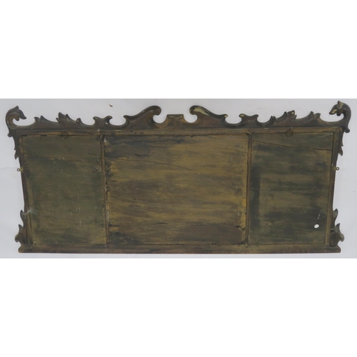 64 - A GEORGIAN STYLE WALNUT TRIPTYCH MIRROR WITH CARVED FRAME