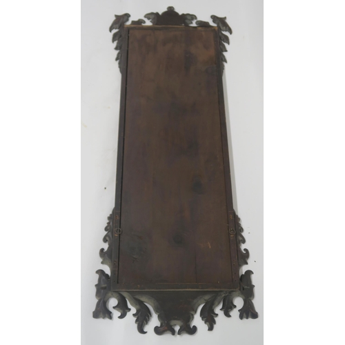 64 - A GEORGIAN STYLE WALNUT TRIPTYCH MIRROR WITH CARVED FRAME