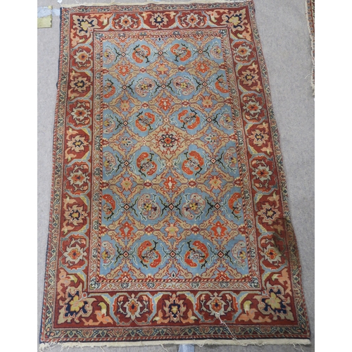 90 - A LIGHT BLUE GROUND EASTERN RUG