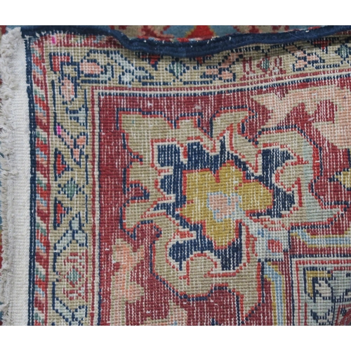 90 - A LIGHT BLUE GROUND EASTERN RUG