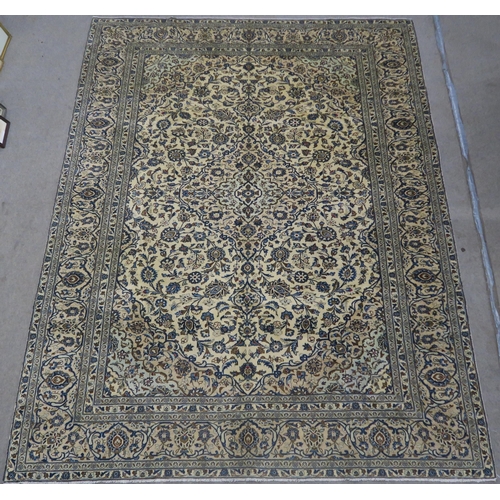 95 - A CREAM GROUND FINE KESHAN RUG