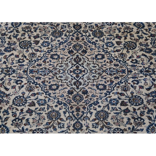 95 - A CREAM GROUND FINE KESHAN RUG