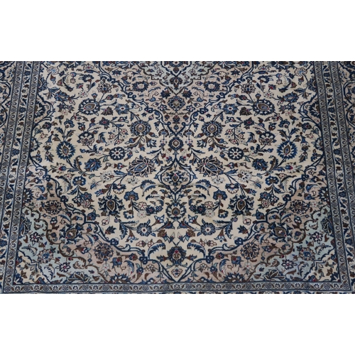 95 - A CREAM GROUND FINE KESHAN RUG