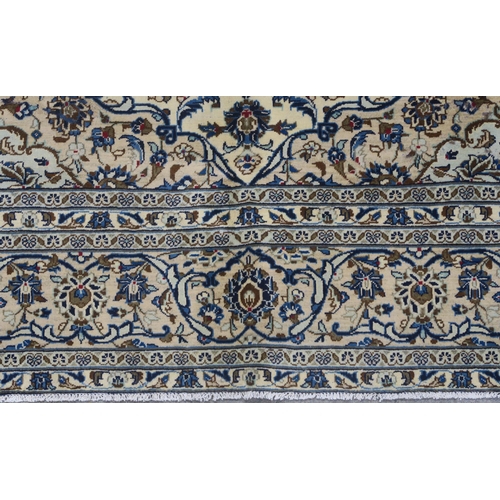 95 - A CREAM GROUND FINE KESHAN RUG