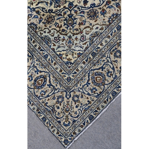 95 - A CREAM GROUND FINE KESHAN RUG