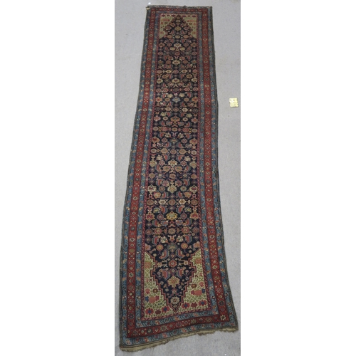 97 - AN INDIGO GROUND PERSIAN RUNNER