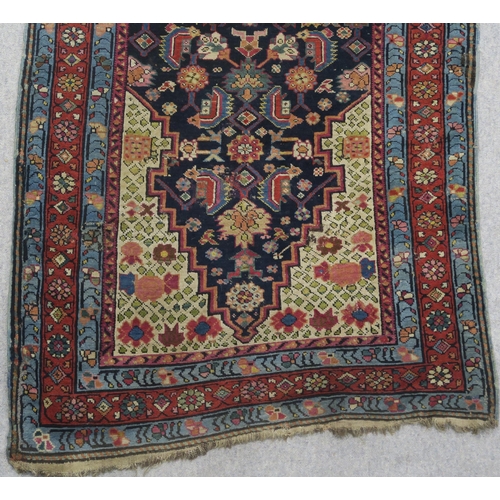 97 - AN INDIGO GROUND PERSIAN RUNNER