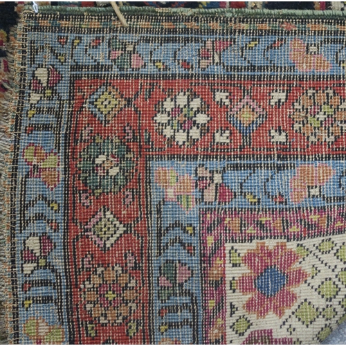 97 - AN INDIGO GROUND PERSIAN RUNNER