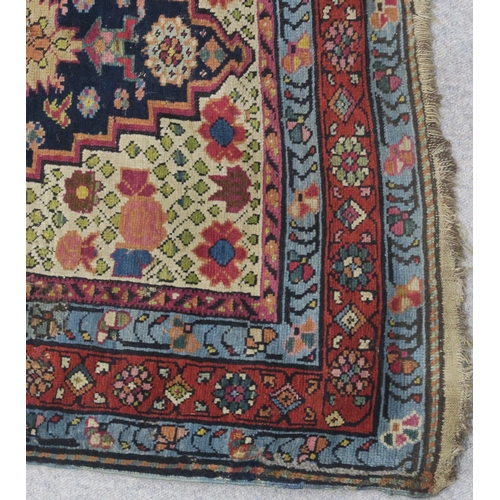 97 - AN INDIGO GROUND PERSIAN RUNNER