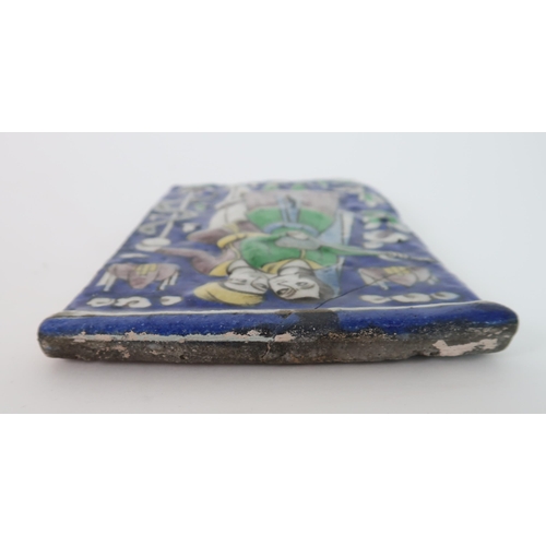 201 - A PERSIAN POTTERY MOULDED TILE