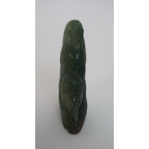 203 - A CHINESE JADEITE SEAL CARVING