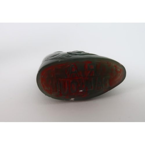 203 - A CHINESE JADEITE SEAL CARVING