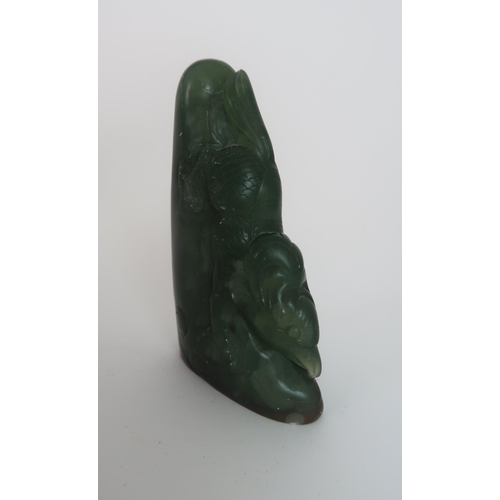 203 - A CHINESE JADEITE SEAL CARVING