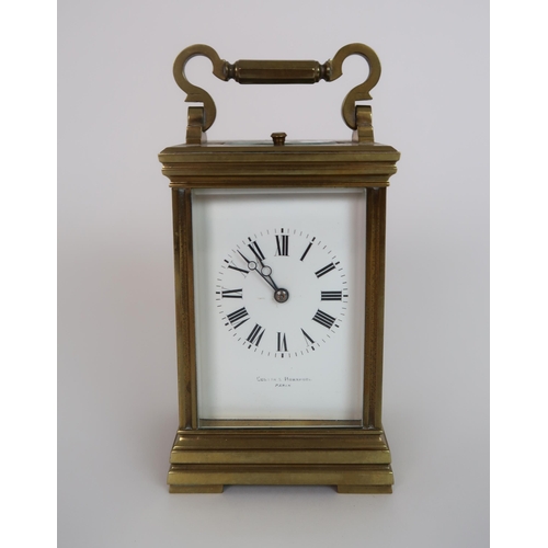 244 - A CURTIS AND HORSPOOL BRASS AND GLASS REPEATING CARRIAGE CLOCK