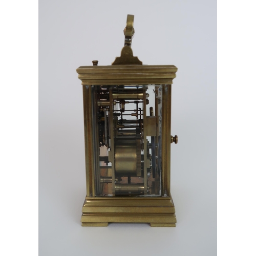 244 - A CURTIS AND HORSPOOL BRASS AND GLASS REPEATING CARRIAGE CLOCK