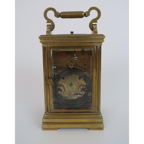 244 - A CURTIS AND HORSPOOL BRASS AND GLASS REPEATING CARRIAGE CLOCK