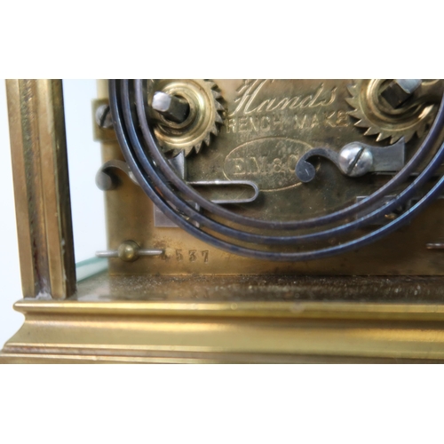 244 - A CURTIS AND HORSPOOL BRASS AND GLASS REPEATING CARRIAGE CLOCK