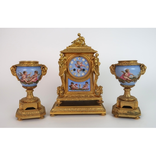 261 - A FRENCH ORMOLU AND PORCELAIN CLOCK AND GARNITURE