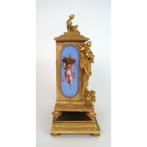 261 - A FRENCH ORMOLU AND PORCELAIN CLOCK AND GARNITURE