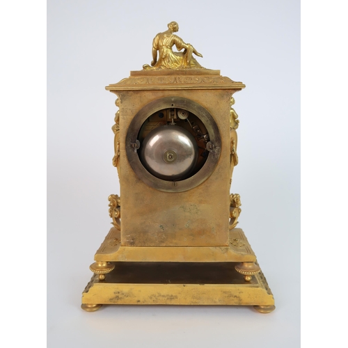 261 - A FRENCH ORMOLU AND PORCELAIN CLOCK AND GARNITURE