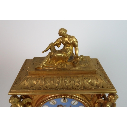 261 - A FRENCH ORMOLU AND PORCELAIN CLOCK AND GARNITURE