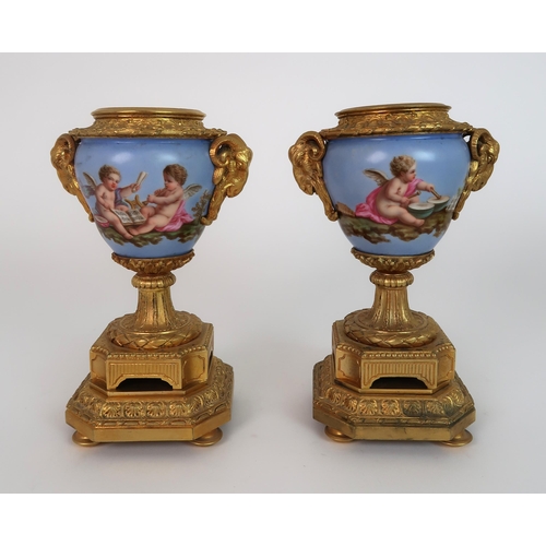 261 - A FRENCH ORMOLU AND PORCELAIN CLOCK AND GARNITURE