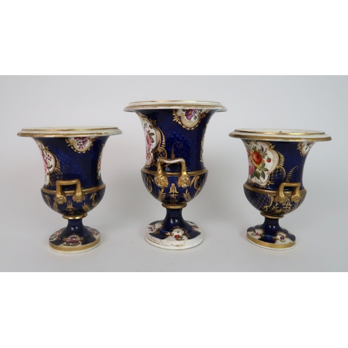 265 - A GARNITURE OF COALPORT STYLE TWO HANDLED URNS