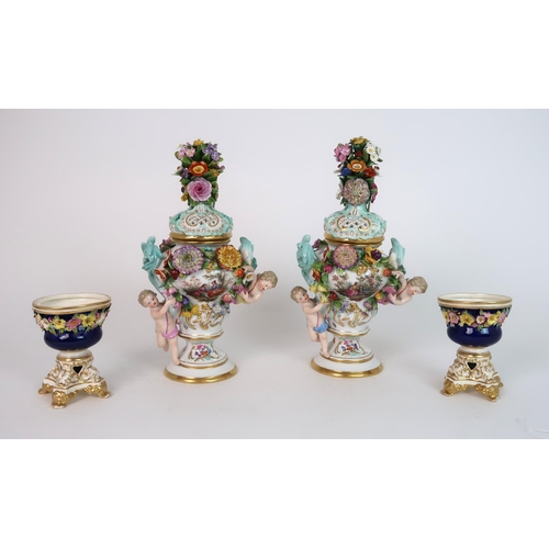 268 - A PAIR OF MEISSEN STYLE FLORAL ENCRUSTED VASES AND COVERS