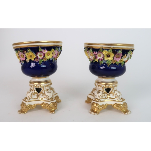 268 - A PAIR OF MEISSEN STYLE FLORAL ENCRUSTED VASES AND COVERS