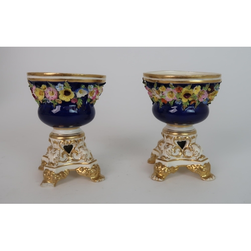 268 - A PAIR OF MEISSEN STYLE FLORAL ENCRUSTED VASES AND COVERS