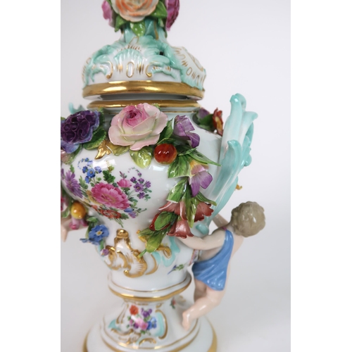 268 - A PAIR OF MEISSEN STYLE FLORAL ENCRUSTED VASES AND COVERS