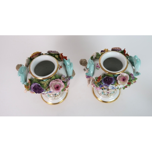 268 - A PAIR OF MEISSEN STYLE FLORAL ENCRUSTED VASES AND COVERS