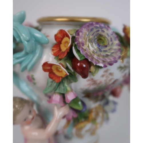 268 - A PAIR OF MEISSEN STYLE FLORAL ENCRUSTED VASES AND COVERS