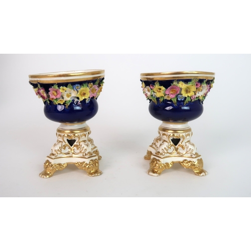 268 - A PAIR OF MEISSEN STYLE FLORAL ENCRUSTED VASES AND COVERS