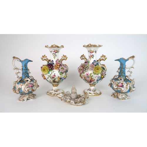 274 - A PAIR OF CONTINENTAL FLORAL ENCRUSTED TWO HANDLED VASES