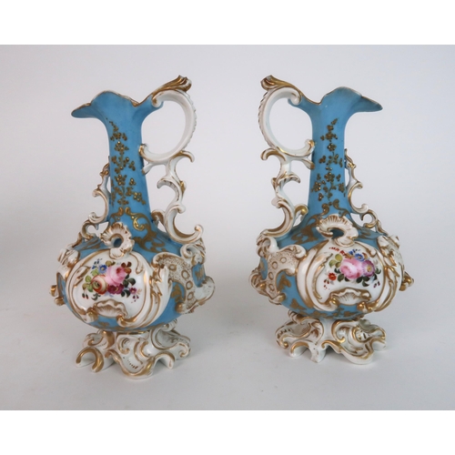 274 - A PAIR OF CONTINENTAL FLORAL ENCRUSTED TWO HANDLED VASES