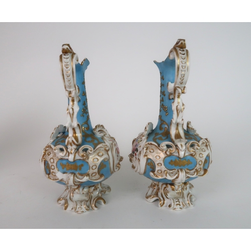 274 - A PAIR OF CONTINENTAL FLORAL ENCRUSTED TWO HANDLED VASES